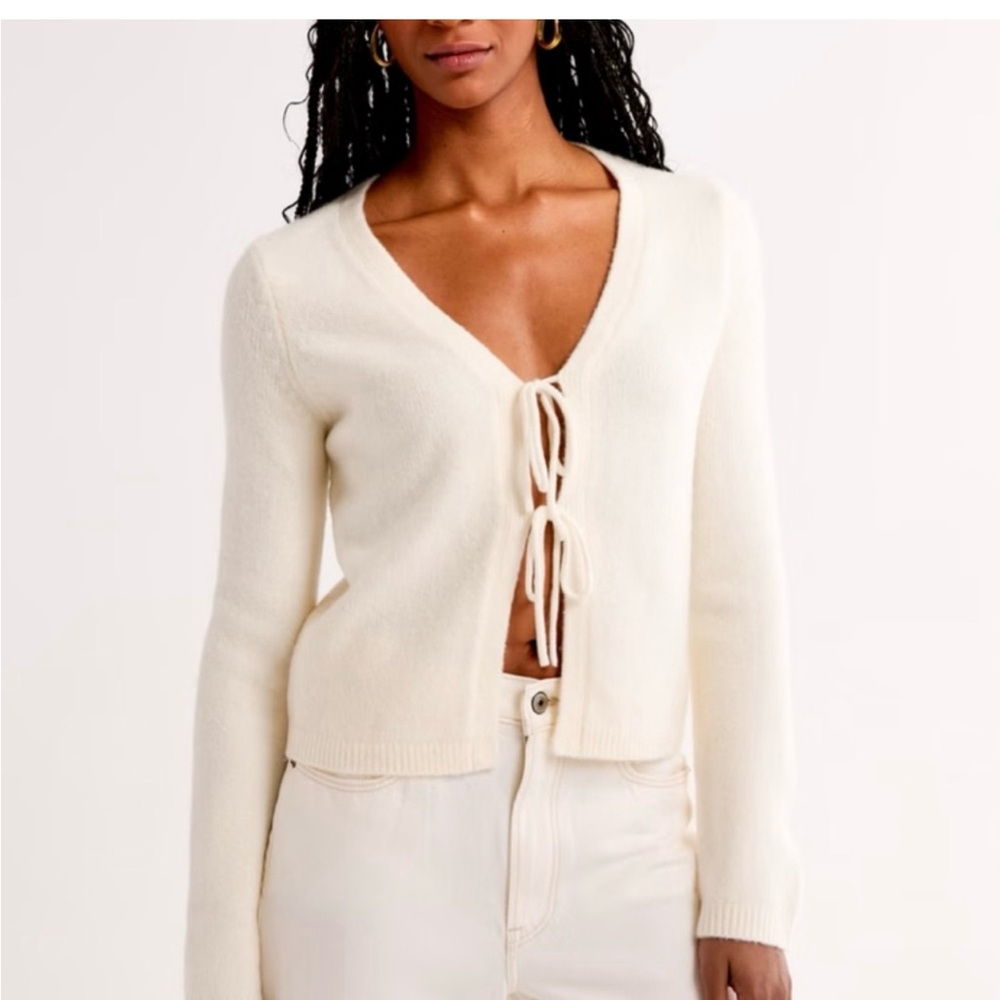 Elegant Cream Sweater with Tie Front